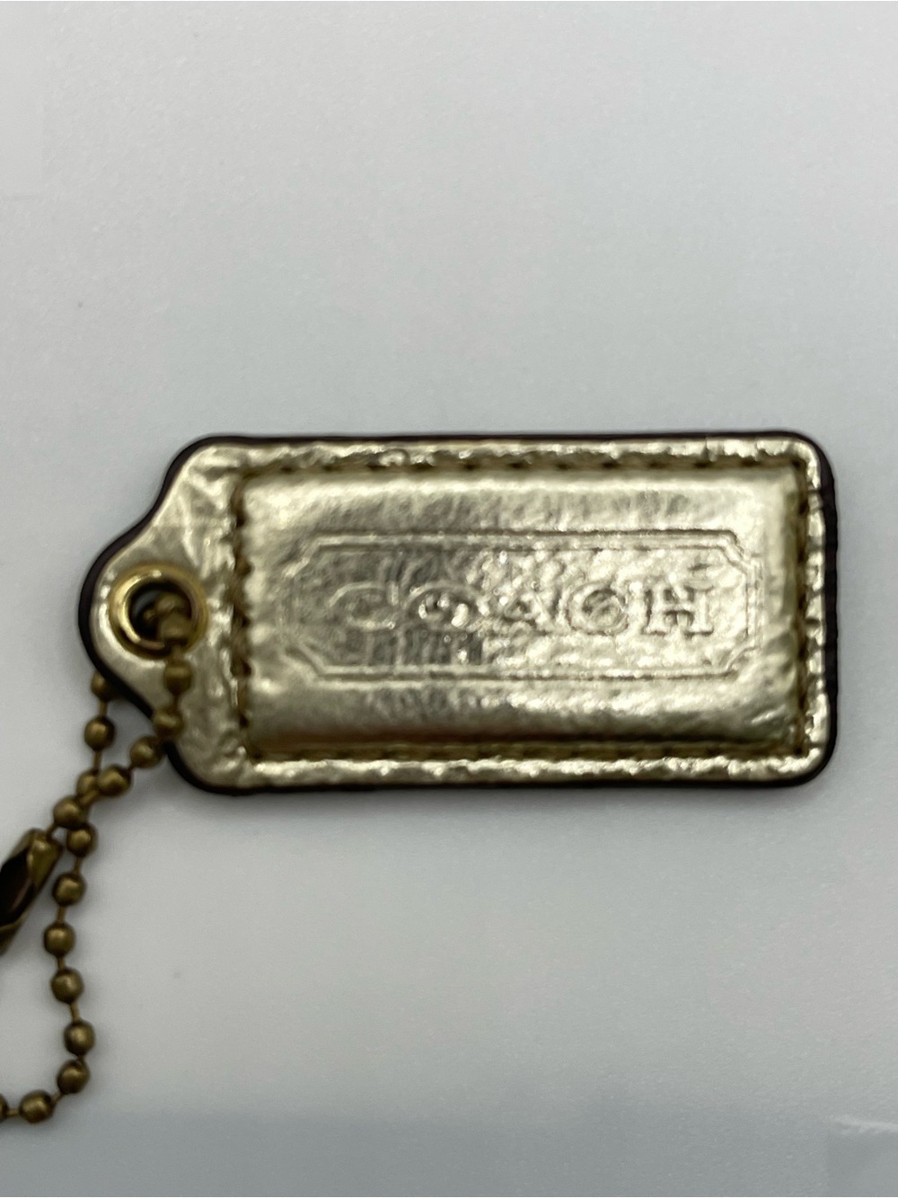 Coach Metallic Gold Leather Hang Tag